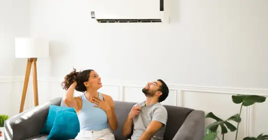 Homeowners feeling hot and looking at their AC