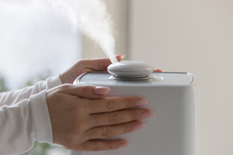 Close-up of a humidifier releasing vapor.